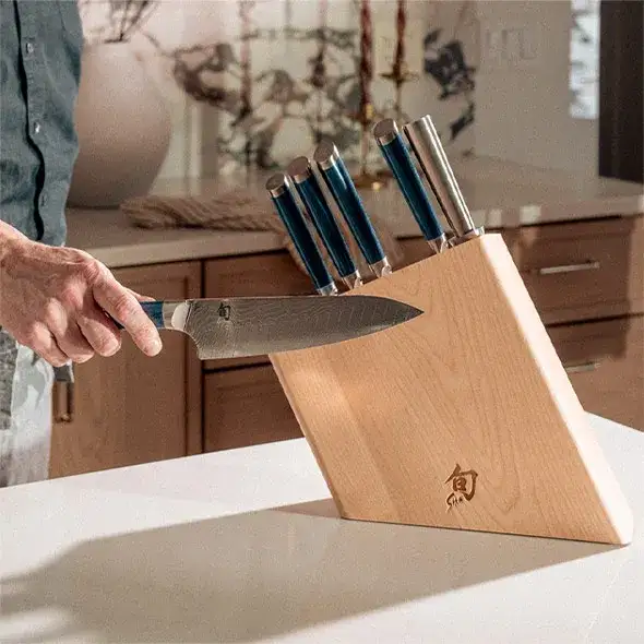 Shun knife block set displayed on a kitchen counter.