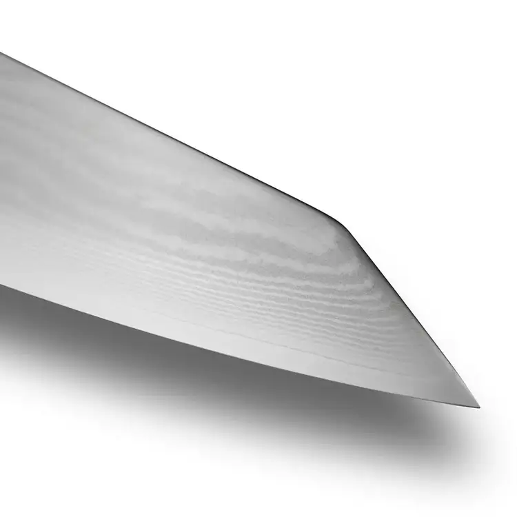 Detailed view of the kensaki tip of a Shun Classic Kiritsuke knife on a white background.